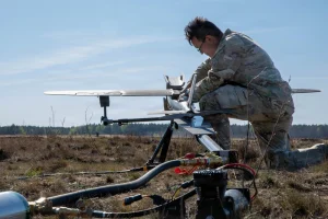 U.S. Army Sgt. Oscar Servin, a tactical unmanned aircraft system specialist, launches a Hornet, one-way strike drone, for launch in preparation for Project Flytrap at Pabradė Training Area, Lithuania, May 3, 2026. (U.S. Army Reserve photo by Sgt. Joseph Honce)