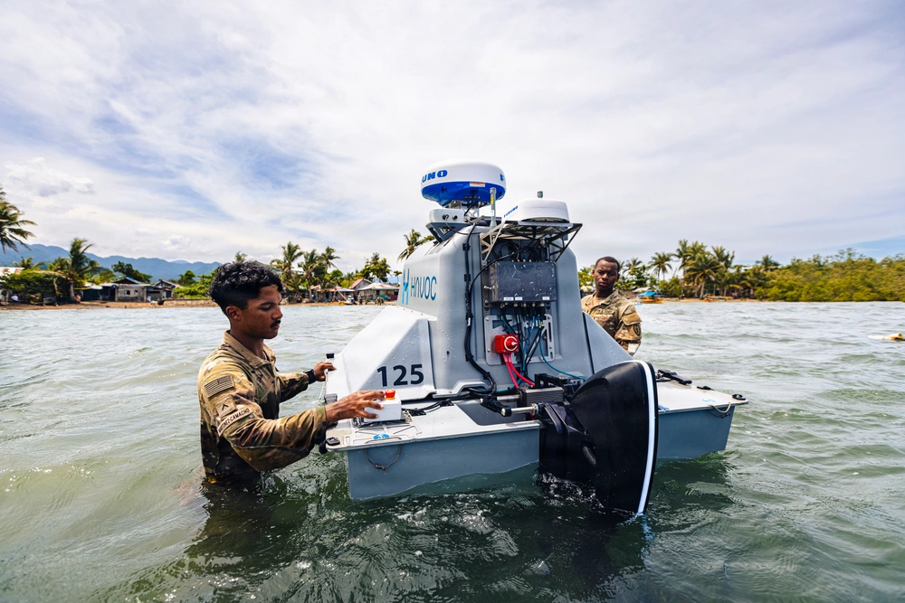 U.S. Army military personnel, assigned to the 125th Intelligence and Electronic Warfare Battalion, recover an unmanned surface vessel during Exercise Salaknib 2026 at Casiguran, Philippines, June 9, 2026. (U.S. Army photo by Pfc. Peter Bannister)